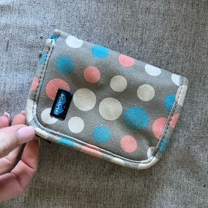Kavu wallet. Middle section zips out. No stains or tears.